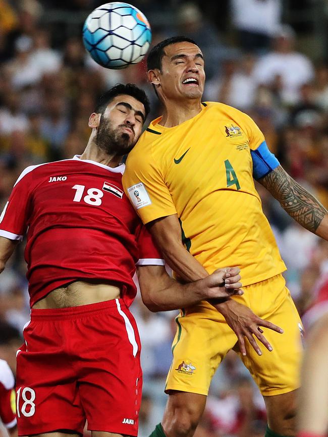 Tim Cahill scores against Syria. Picture: Brett Costello