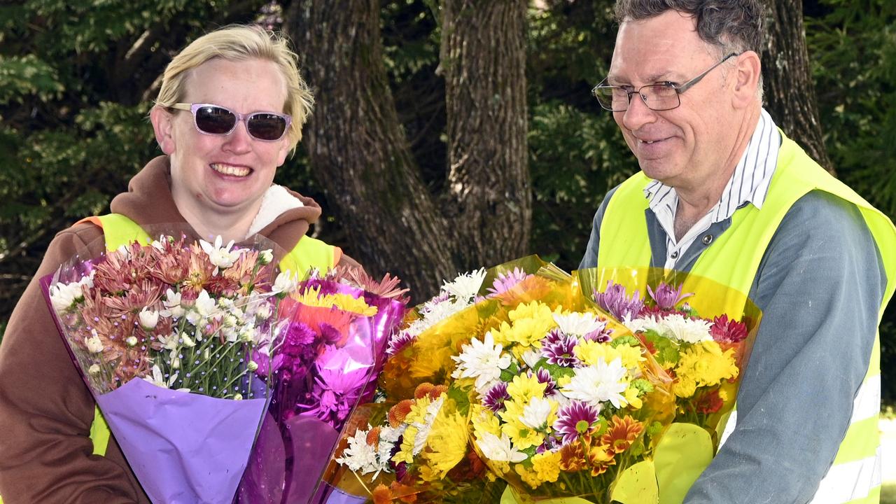 Grace Radcliffe and Ross Caldwell. Endeavour is selling flowers for Mother's Day from the foundation in Ramsay Street.