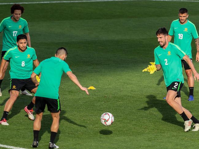 Players of Australia's national football team take part in a training session, ahead of the UAE 2019 AFC Asian Cup, in Al-Ain on January 4, 2019. (Photo by KARIM SAHIB / AFP)