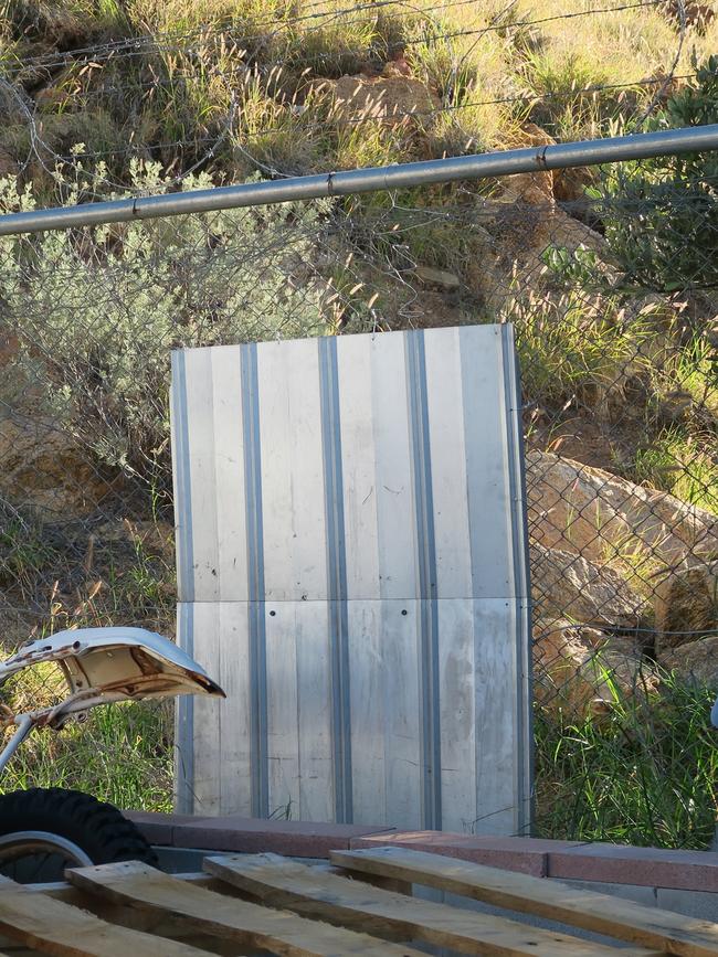 The section of fence – now closed up – which was cut open so the intruders could gain access to the premises.