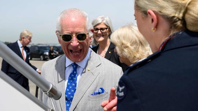 King Charles III gestures before boarding a plane at Sydney Airport in Sydney on Saturday after a six-day royal visit to Sydney and Canberra. Picture: Bianca De Marchi/Pool/AFP