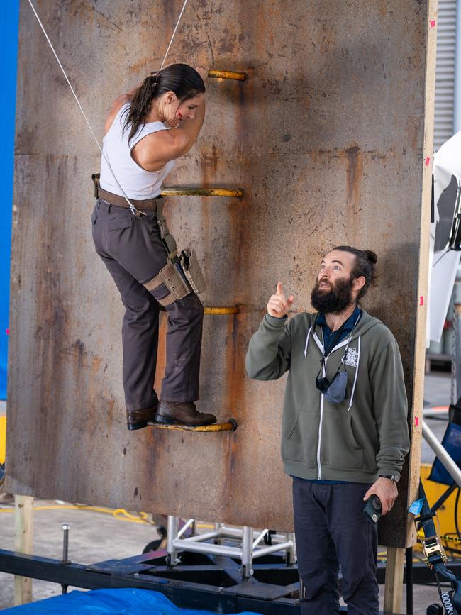 Elsa Pataky speaks to action consultant Sam Hargrave on the set of Interceptor. Picture: Netflix