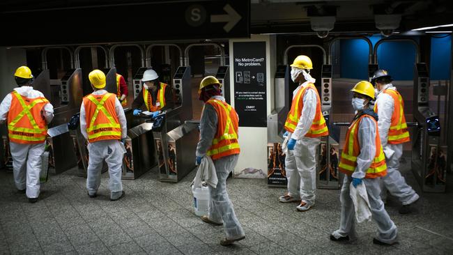 Workers clean Grand Central station in New York. Picture: AFP