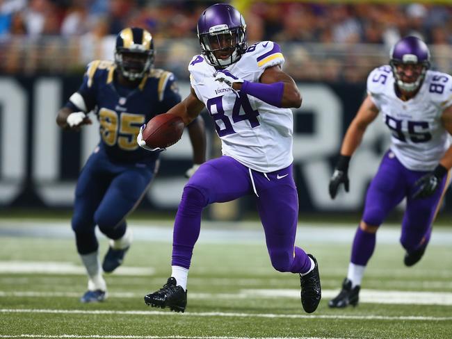 Cordarrelle Patterson #84 of the Minnesota Vikings runs to score a touchdown against the St. Louis Rams.