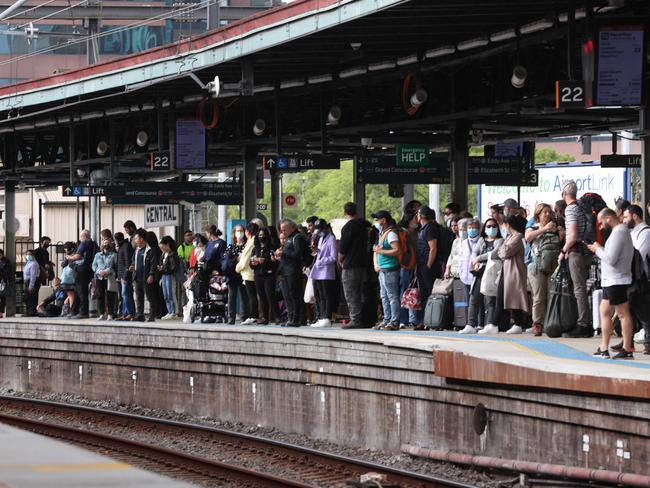 SYDNEY, AUSTRALIA - NewsWire Photos AUGUST 31, 2022: People packed onto platform 22 at Central Station as they wait for a train. Industrial union action is causing delays and less trains on the train and bus networks.Picture: NCA NewsWire / Damian Shaw