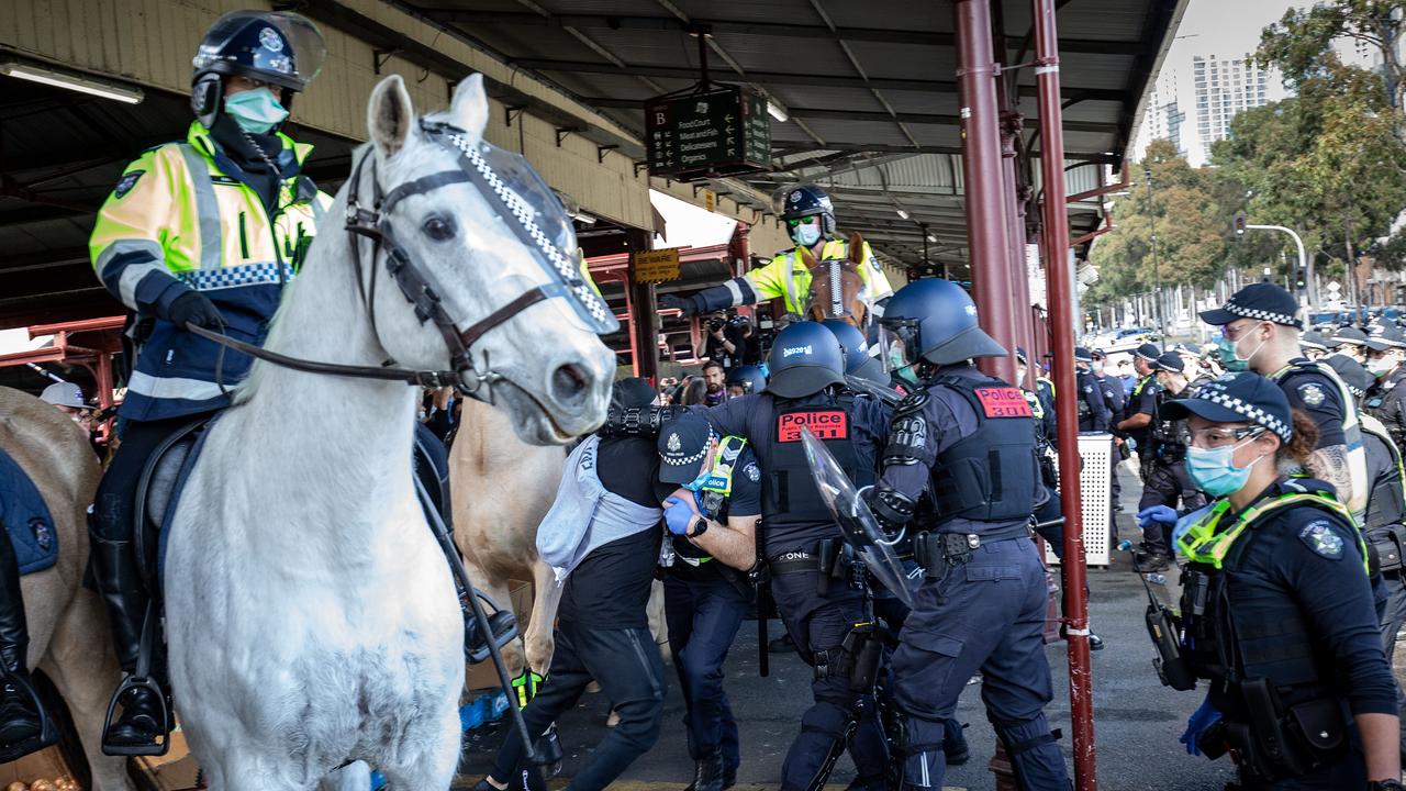 Protesters clash with police at the market. Picture: Darrian Traynor/Getty Images