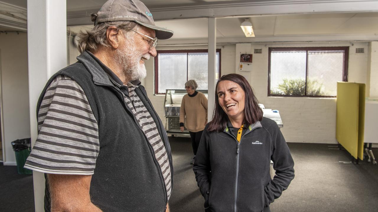 Mike Bourke lives in his car with his dog Misty. He’s pictured with Tiff Spary from BASE Services. Picture: Nev Madsen.