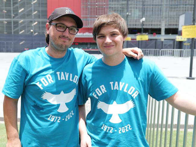 Foo Fighter superfans Damian Caplin and Joshua Caplin outside Suncorp Stadium. Picture: Georgia Clelland