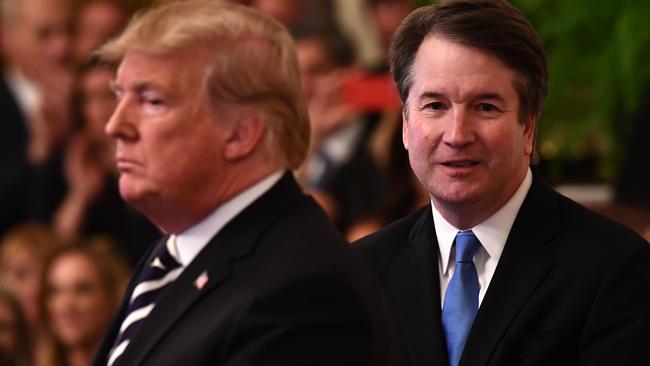 Then President Donald Trump participates in the swearing-in ceremony of Brett Kavanaugh (R) as Associate Justice of the US Supreme Court at the White House. Picture: AFP.