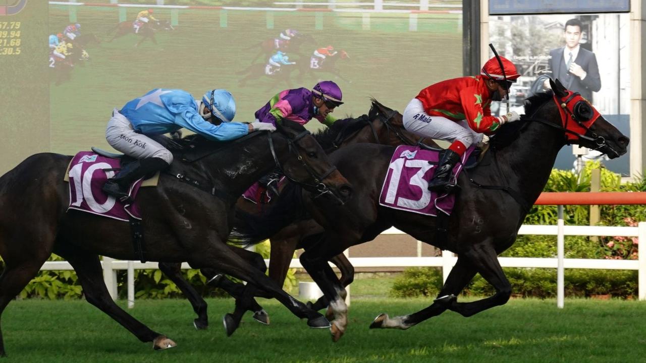 Aramayo defeats Countoofmontecristo in the Kranji Mile last year. Photo: Singapore Turf Club.