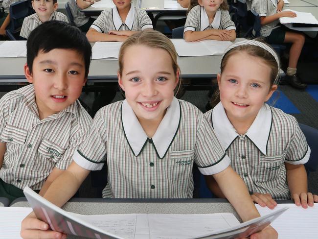 AB Paterson College has done really well in Naplan results. Year three students Elie Kim 8, Jasmine Morris 8 and Teegan Mitchell 8 happy with the results. Picture Glenn Hampson