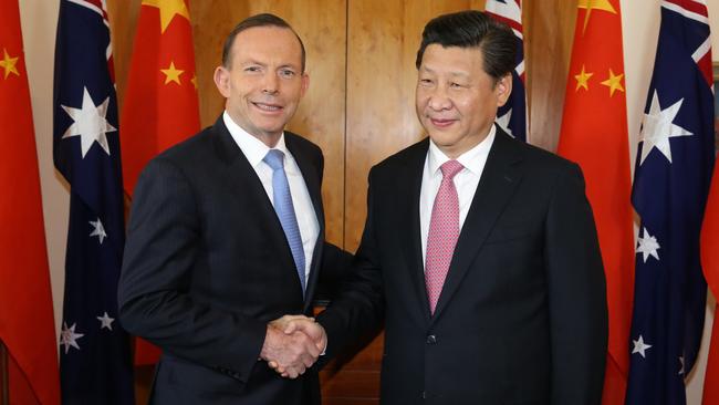 Then Prime Minister Tony Abbott welcomes Chinese President Xi Jinping to his office in Parliament House, Canberra, in 2014.