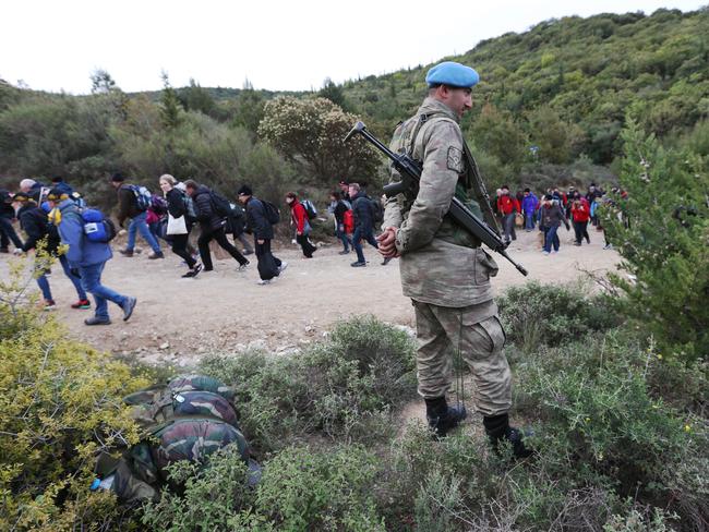 Armed Turkish troops guard the pilgrims attending the 2015 service at Anzac Cove. Picture: News Corp Australia