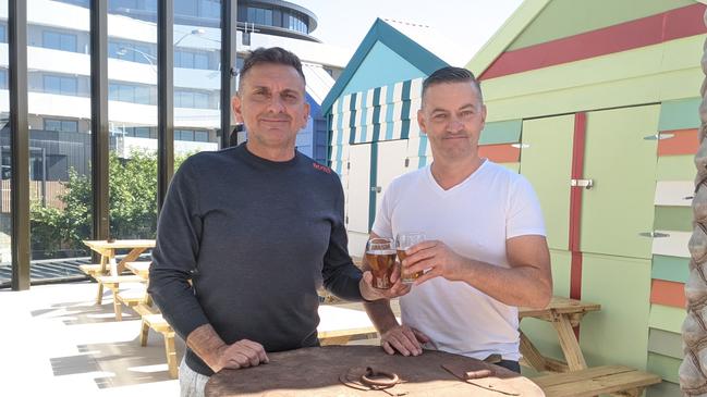 Owner Joe Cossari and entertainment director Victor Smith in The Bungalow’s beer garden. Picture: Kiel Egging.