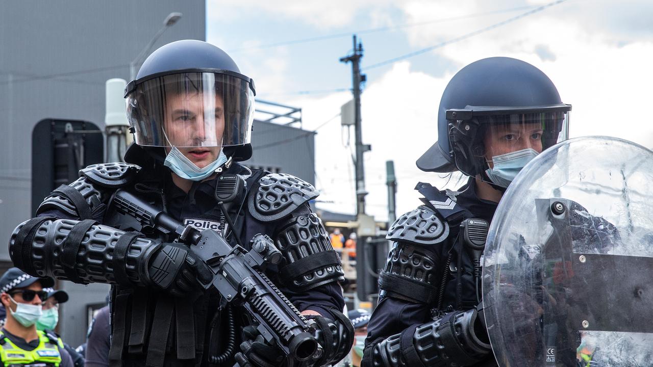 Police fire tear gas and rubber bullets at Freedom Rally protesters. Picture: NCA NewsWire/Sarah Matray