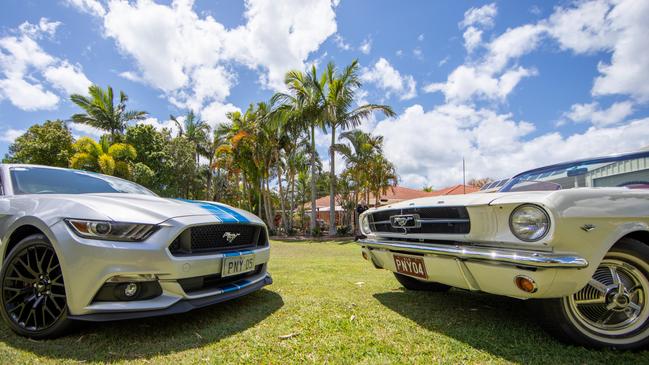 Alan and Robyn Messenger's 1964 1/2 Ford Mustang with the 2017 model. Picture: Dominika Lis.