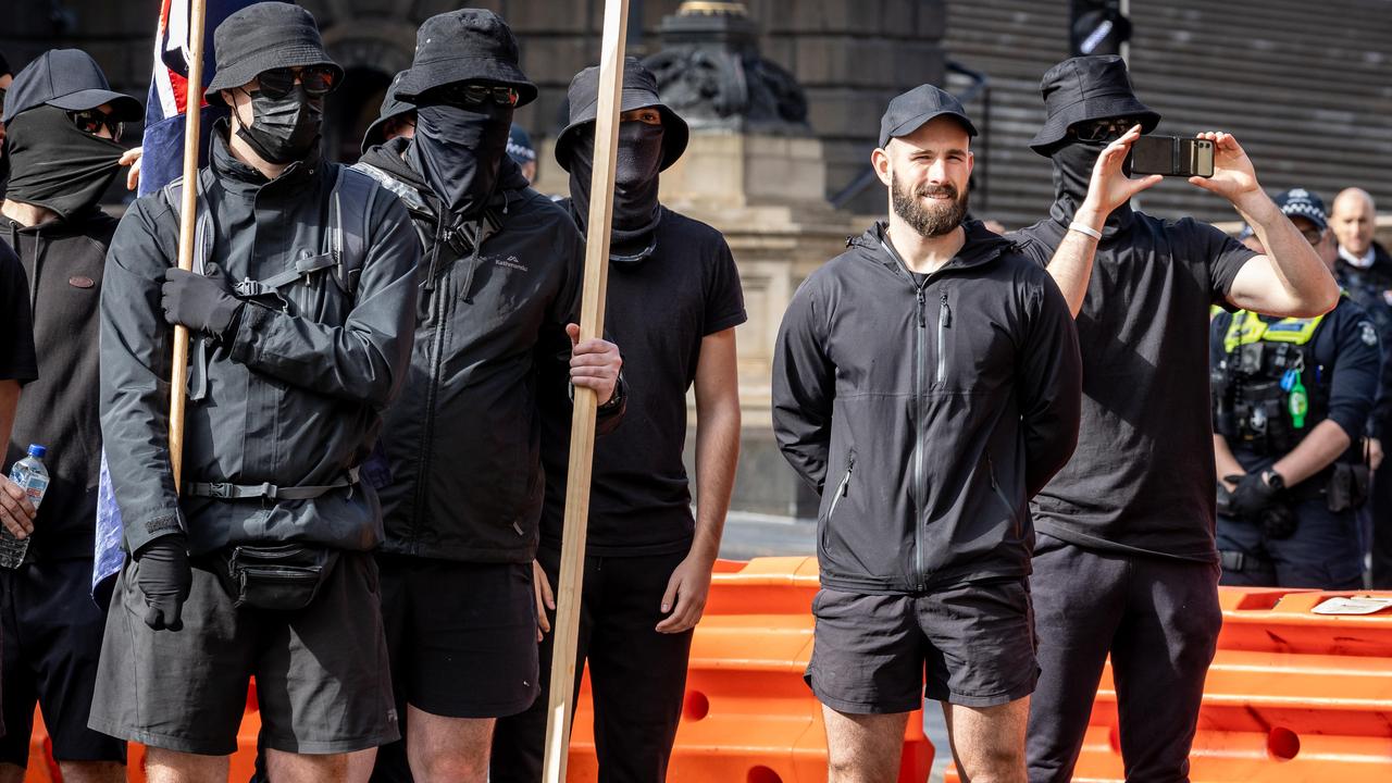 Thomas Sewell stands by his group of National Socialist Network neo-Nazis. Picture: Jake Nowakowski