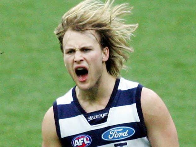 03/09/2005. Gary Ablett Jr gives Aaron Davey a spray after he kicked a goal. Melbourne v Geelong. MCG. 2nd Elimination Final.