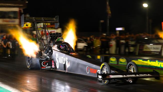 Wayne Newby participating in a drag racing event.