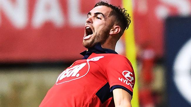 ADELAIDE, AUSTRALIA - MARCH 30:  Ben Garuccio of Adelaide United scores and celebrates during the round 25 A-League match between Adelaide United and the Wellington Phoenix at Coopers Stadium on March 30, 2018 in Adelaide, Australia.  (Photo by Mark Brake/Getty Images)