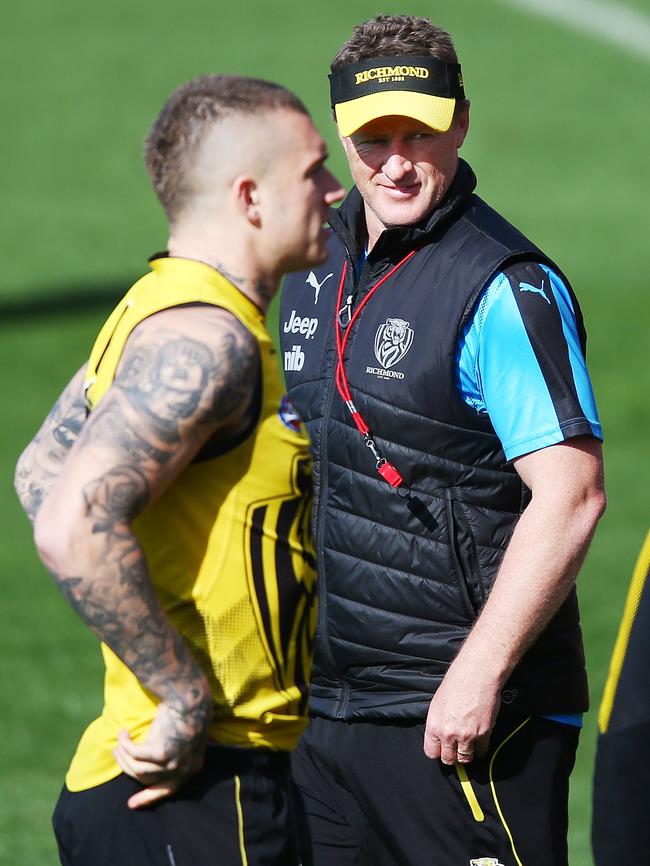 Damien Hardwick looks on as Dustin Martin warms up.