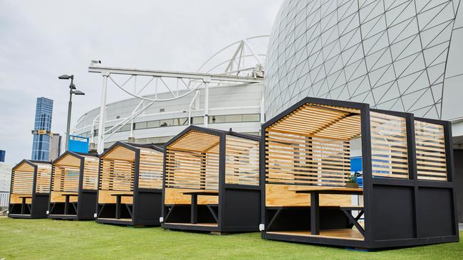 Dining pods have been set up at Melbourne Park. Picture: Graham Denholm/Tennis Australia.