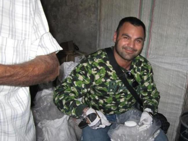 Hakan Ayik at a pharmaceutical factory in India where he is alleged to have purchased drug precursors.