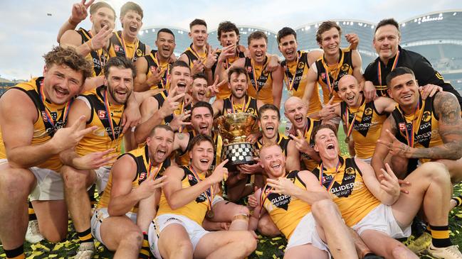 Glenelg players celebrate after winning the 2024 SANFL grand final against Norwood at Adelaide Oval. Picture: David Mariuz/SANFL