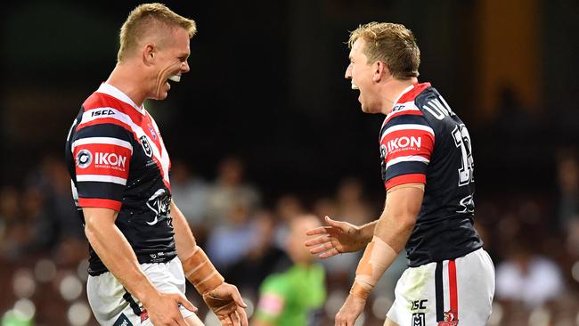 Mitchell Aubusson and Lindsay Collins celebrate a try. Picture: AAP Image/Dean Lewins