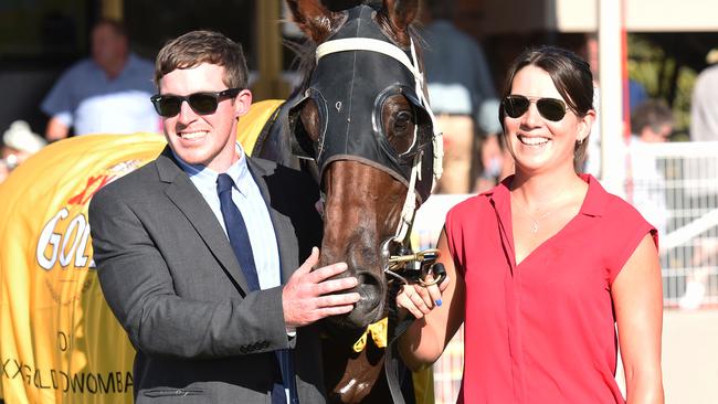 Trainer Ben Currie and Clare Farrow with Toowoomba Cup winner Honey Toast. Picture: Grant Peters