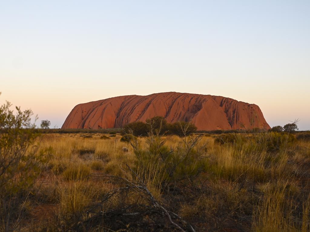 Uluru, also known as Ayers Rock is seen during sunset at Uluru-Kata Tjuta National Park in the Northern Territory, Thursday, October 10, 2019. (AAP Image/Lukas Coch) NO ARCHIVING