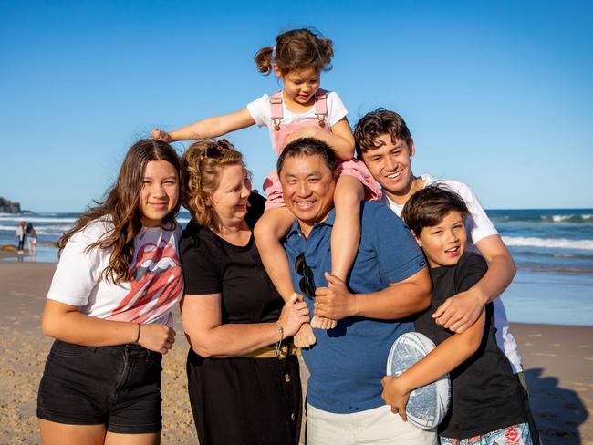 Michelle and Francis Kyan with their 4 kids Adele 4, Elijah 10, Ava 13, Xavier 16 on Lighthouse Beach in Port Macquarie. Pic: Lindsay Moller Productions