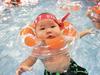 Chinese babies accompanied by their parents take part in a baby swimming contest, which the organizer hopes to break the Guinness World Record for the most babies swimming together, at a stadium in Beijing, China, 11/09/2010. China's government maintains that the one child policy has averted 400 million births since the strict policy implemented in 1979 and has vowed to enforce it until at least 2033, when the population is expected to peak at 1.5 billion.