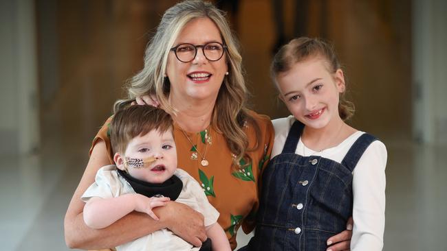 Good Friday Appeal chairman Penny Fowler with the 2024 faces of the appeal, Finley Every, 2, and Emily Cooke, 10. Picture: David Caird