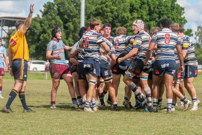 Brothers boys celebrate a scrum win. Photography by Stephen Archer