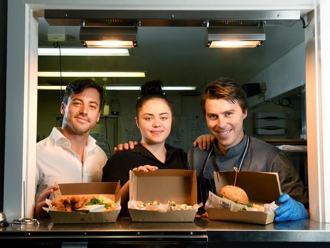 RURAL UBER EATS/CORONAVIRUS. Riverscape Food & Wine, Murray Bridge owner - Jake Sutcliffe, waitress - Lekirra Polaski, chef Brad Towns. STORY: Country areas don't have access to Uber Eats but some rural businesses are adding takeaway deliveries to try and keep afloat through coronavirus. Jake Sutcliffe's business Riverscape was closed for five months after a fire last year and was just starting to pick up again when coronavirus hit - leading to 120 cancellations already. Picture: Tricia Watkinson