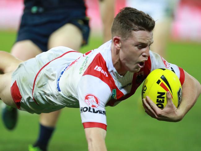 Jai Field of the dragons scores a try during the Holden Cup between the Cowboys and the Dragons. Pic Darren England.