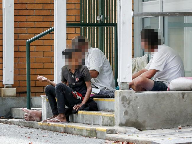 Homeless people in Southport, faces blurred.