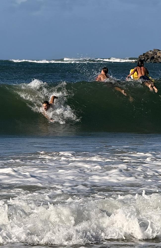 Board riders were being crunched in the big swell at Mooloolaba late Thursday afternoon as Tropical Cyclone Alfred hovered off the Qld coastline. Photo: Mark Furler