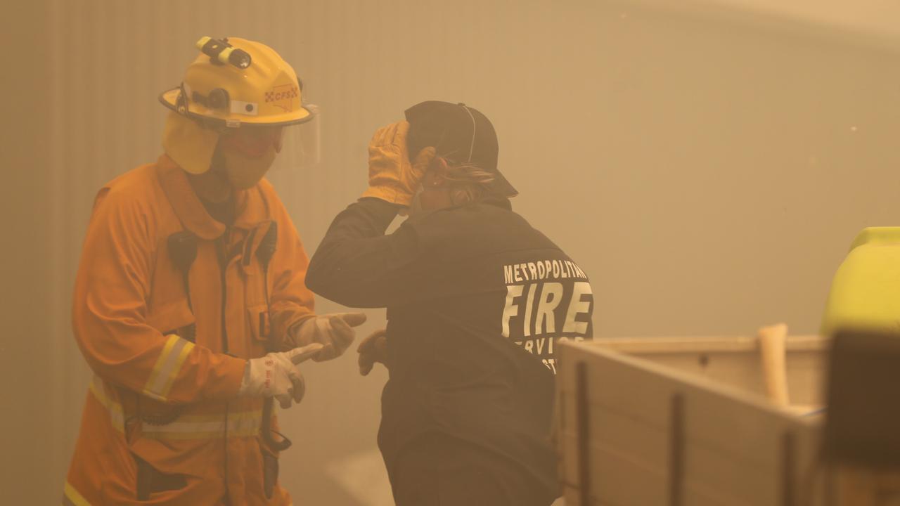 Firefighters from the Country and Metropolitan Fire Services at the Cudlee Creek fire. Picture: Tait Schmaal