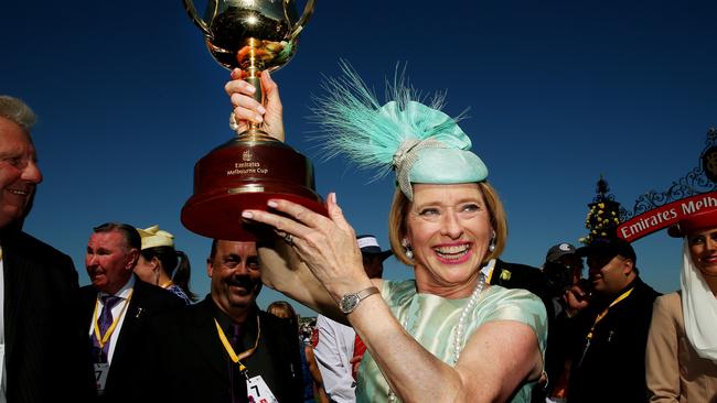 2013 Melbourne Cup Day Flemington Racecourse, Melbourne - November 5th, Picture by Colleen Petch. Race 7 - Emirates Melbourne Cup 3200m - Trainer Gai Waterhouse holds the cup after winning the cup with Fiorente with Damien Oliver onboard.