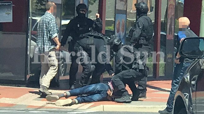 A man is arrested in Werribee by Special Operations Group officers. Picture: Jessica Karasmanis