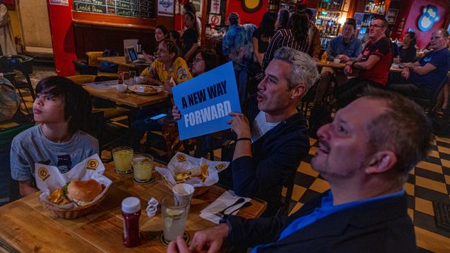 Residents of Taiwan watch the coverage of the US election on Wednesday (Tuesday US time). Picture: Getty Images