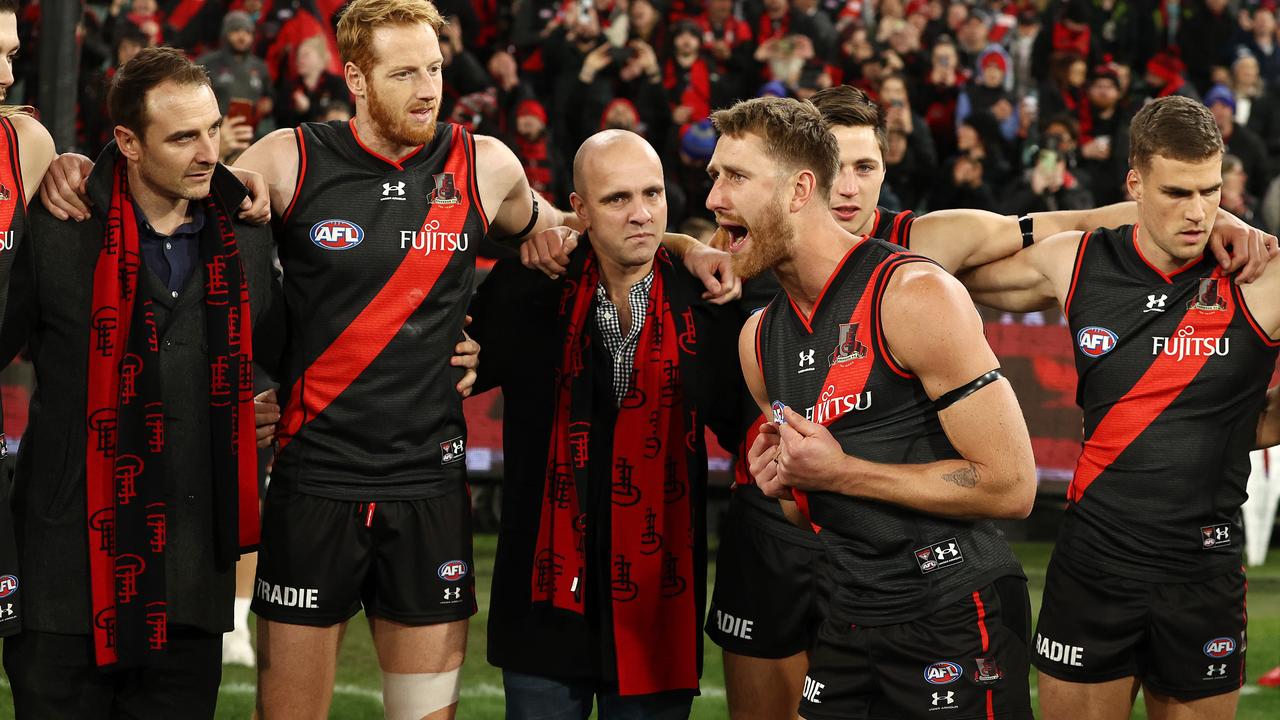 MELBOURNE. 10/06/2022.. AFL Round 13. Essendon vs Carlton at the MCG. Dyson Heppell, skipper of the Bombers speaks to the group including the past players before opening bounce . Photo by Michael Klein