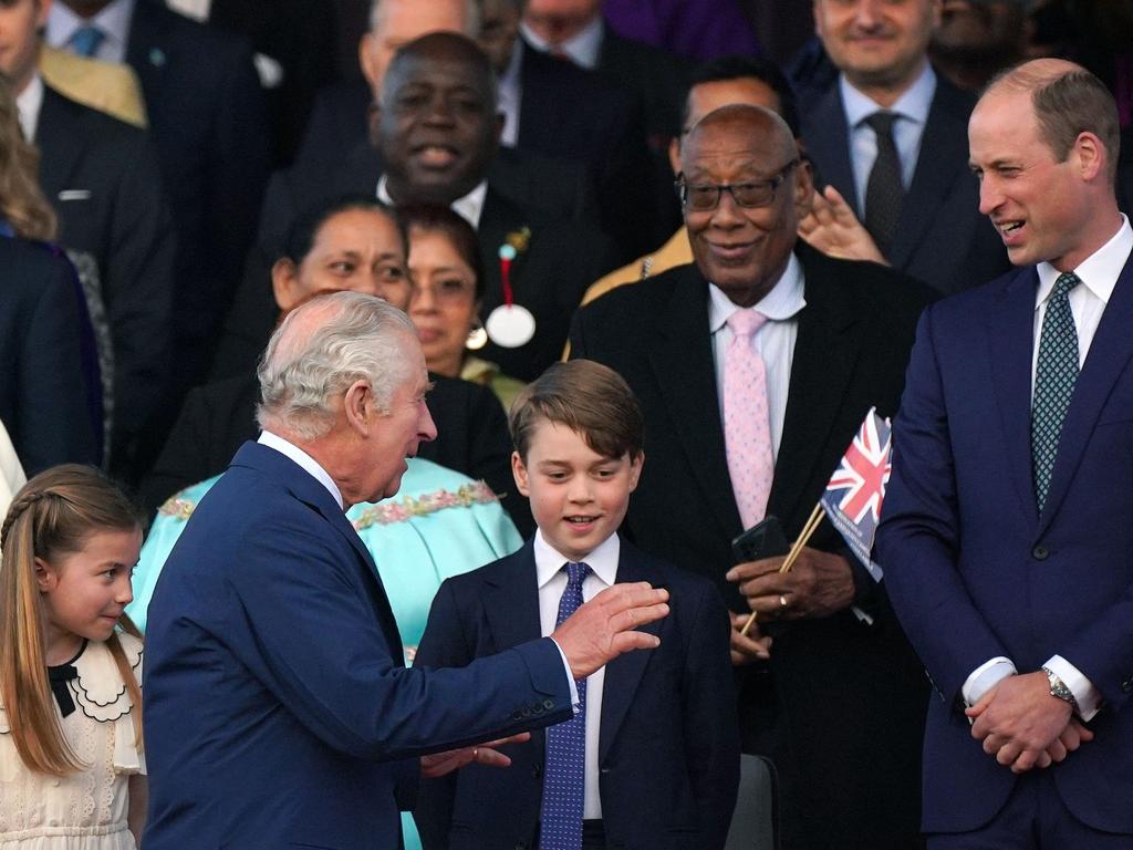 Prince William, Prince George, Princess Charlotteand King Charles take their seats. Picture: AFP