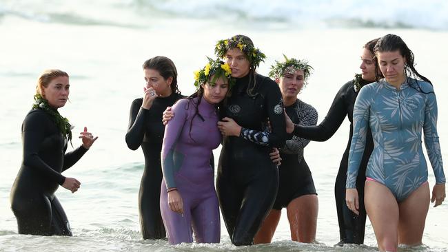 GOLD COAST, AUSTRALIA - JULY 11: Alex Pullin's girlfriend Ellidy Vlug is supported by family and friends in memory of Alex 'Chumpy' Pullin on July 11, 2020 in Gold Coast, Australia. Australian Winter Olympic Games Snowboarder Alex 'Chumpy' Pullin died on Wednesday 8 July in a drowning accident while spearfishing at Palm Beach on the Gold Coast, aged 32. (Photo by Chris Hyde/Getty Images)
