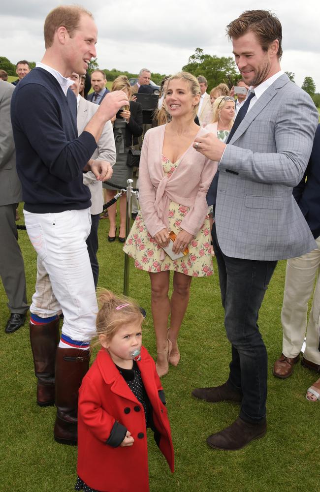 “And did I tell you about that time I wasn’t just PLAYING a prince, but actually WAS a prince” ... Prince William shares a yarn with Elsa Pataky, Chris Hemsworth and an uninterested India Rose. Picture: Getty