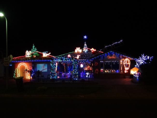 The Gray house at night in Christmas.