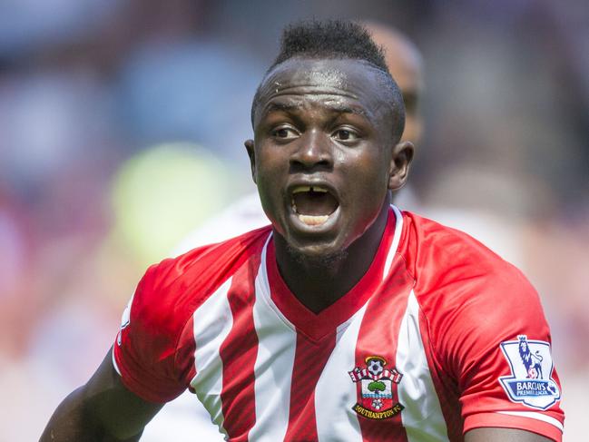 Southampton's Sadio Mane celebrates scoring the fastest hat-trick in Premier League history, during their English Premier League soccer match against Aston Villa at St Mary's, Southampton, England, Saturday, May 16, 2015. The Senegal midfielder's hat trick was timed at 2 minutes, 56 seconds at St Mary's Stadium. (Chris Ison/PA via AP) UNITED KINGDOM OUT - NO SALES - NO ARCHIVES