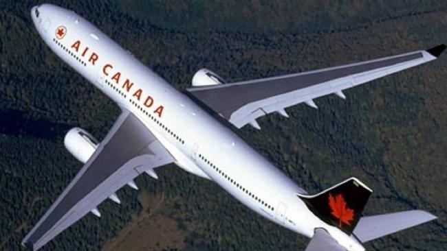 A passenger has tried to open a door while on-board an Air Canada flight from Vancouver to Brisbane. Picture: News Corp Australia